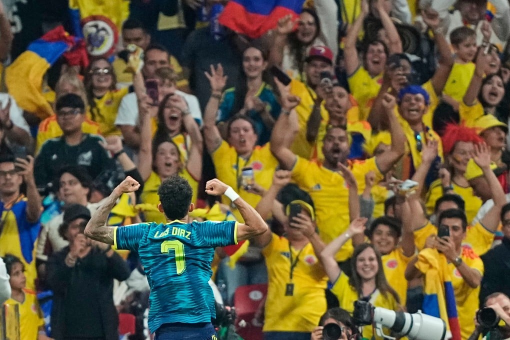 Luis Diaz celebrates his goal in front of a bank of Colombia supporters. Photo: AP Photo