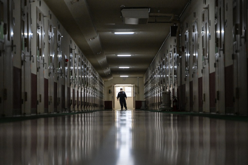 A staff member stands at the end of a corridor of a prison in Tokyo on February 22, 2024. Photo: AFP