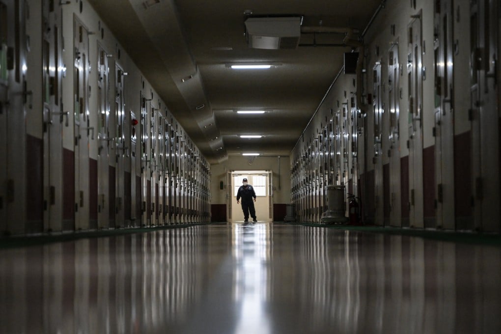 A staff member stands at the end of a corridor of a prison in Tokyo on February 22, 2024. Photo: AFP