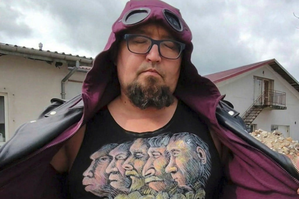 Russian artist Robert Kuzovkov, also known by his artistic pseudonym Semyon Skrepetsky, shows off a T-shirt with one of his works. Photo: Facebook/Reuters