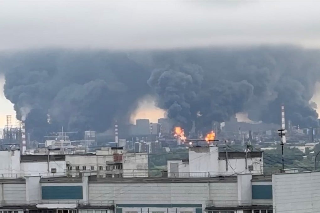 Thick plumes of smoke and flames rise from an oil refinery in Moscow on Thursday. Photo: Social media via Reuters
