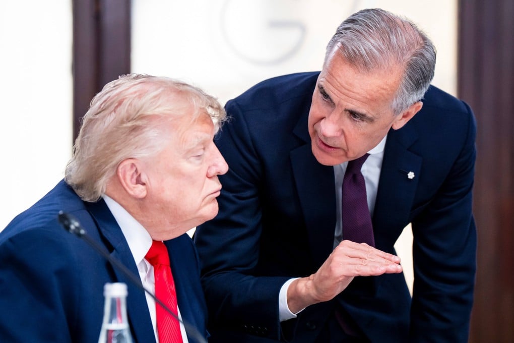 Canadian Prime Minister Mark Carney speaks to US President Donald Trump during the G7 Summit in Evian, France, on Tuesday. Photo: dpa