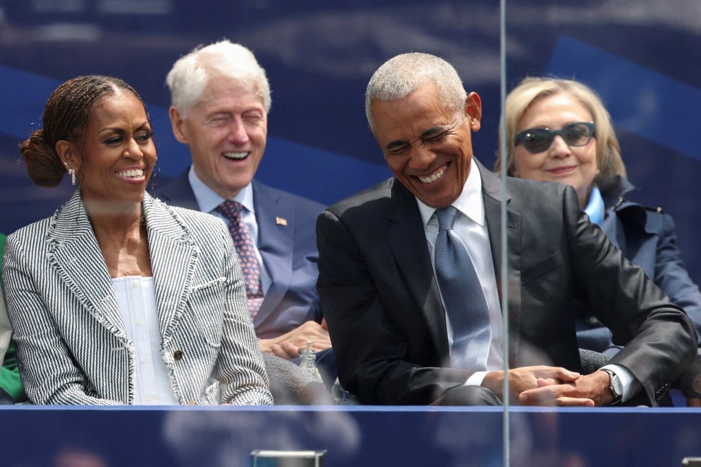 The Obamas and the Clintons at the opening of the complex in Chicago. Photo: Reuters
