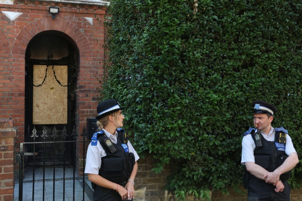 Police officers stand guard outside British Prime Minister Keir Starmer’s private home in north London after it was damaged in a suspected arson attack on May 13, 2025. Photo: Reuters