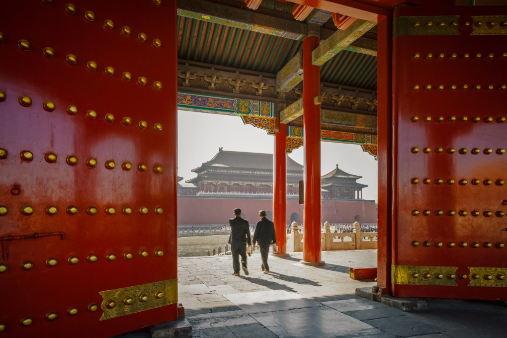 Visitors feel the weight of the Forbidden City as they step through its gates. Photo: Getty Images