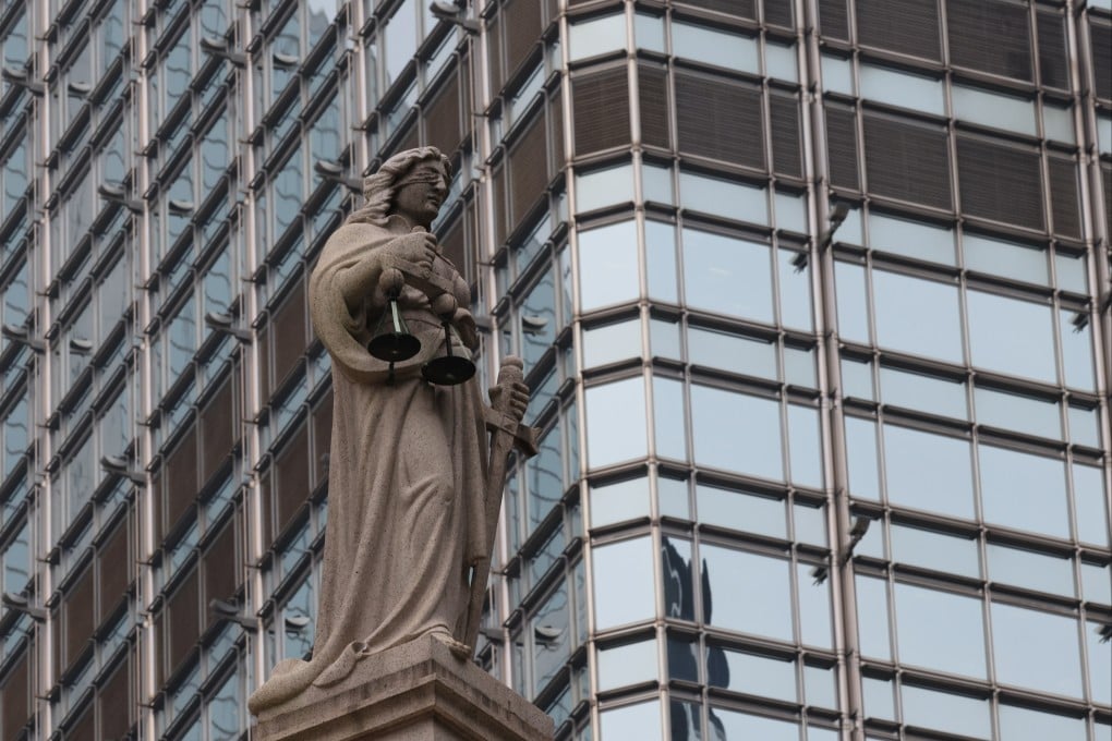 The statue of Lady Justice atop the Court of Final Appeal in Central. Photo: Yik Yeung-man