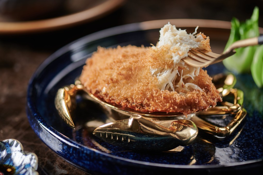 Crab shell stuffed with crabmeat from Ming Court in Wan Chai, Hong Kong. The restaurant has launched a new HK$788 daily set menu, put together by award-winning chef Tsang Chiu-king. Photo: Ming Court Wan Chai