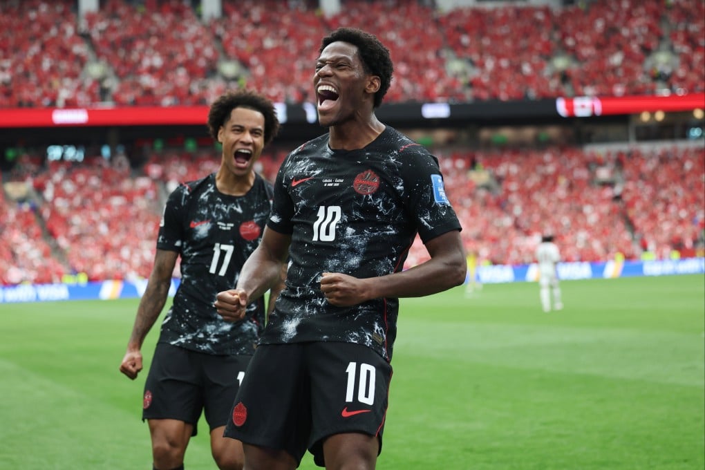 Hat-trick hero Jonathan David celebrates scoring his first, and his side’s second, against Qatar. Photo: AP