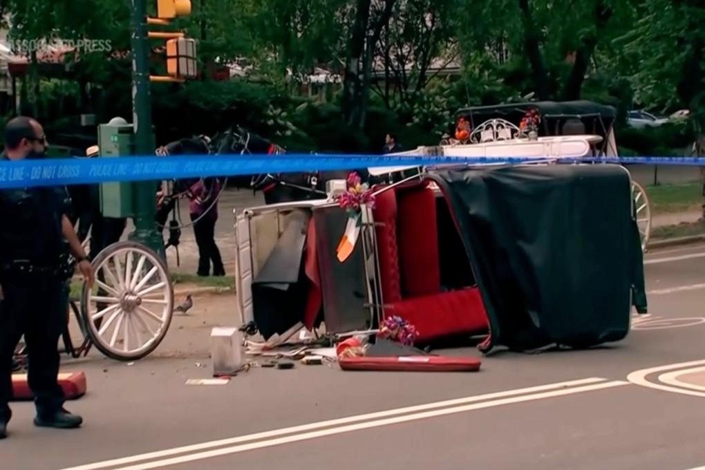 Police at the scene of the horse carriage crash in Central Park. Photo: WABC-TV via AP