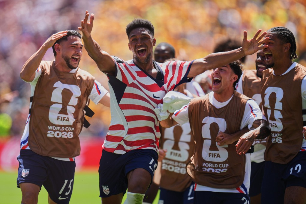 United States’ Alex Freeman (centre) celebrates after scoring his side’s second in Seattle. Photo: AP