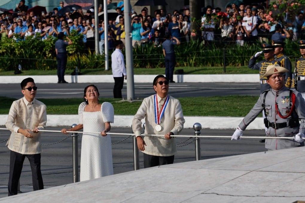 Philippine President Ferdinand Marcos Jnr (third from left), with his wife Liza Araneta-Marcos and their son, Congressman Sandro Marcos (left), mak the country’s independence day in Manila on June 12. Photo: EPA