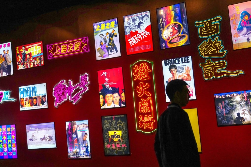 A neon-lit poster wall celebrates classic Hong Kong cinema at the “Hong Kong Film Archive Stories: Treasure Hunting for 25 Years” exhibition. Photo: Karma Lo