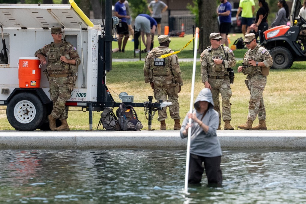 Members of the National Guard patrol the Lincoln Memorial Reflecting Pool in Washington on Sunday. Photo: Reuters