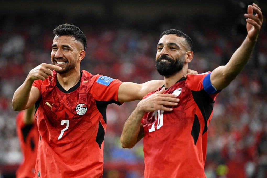 Egypt’s Mahmoud Trezeguet (left) celebrates scoring their third goal against New Zealand with Mohamed Salah at the World Cup. Photo: Reuters