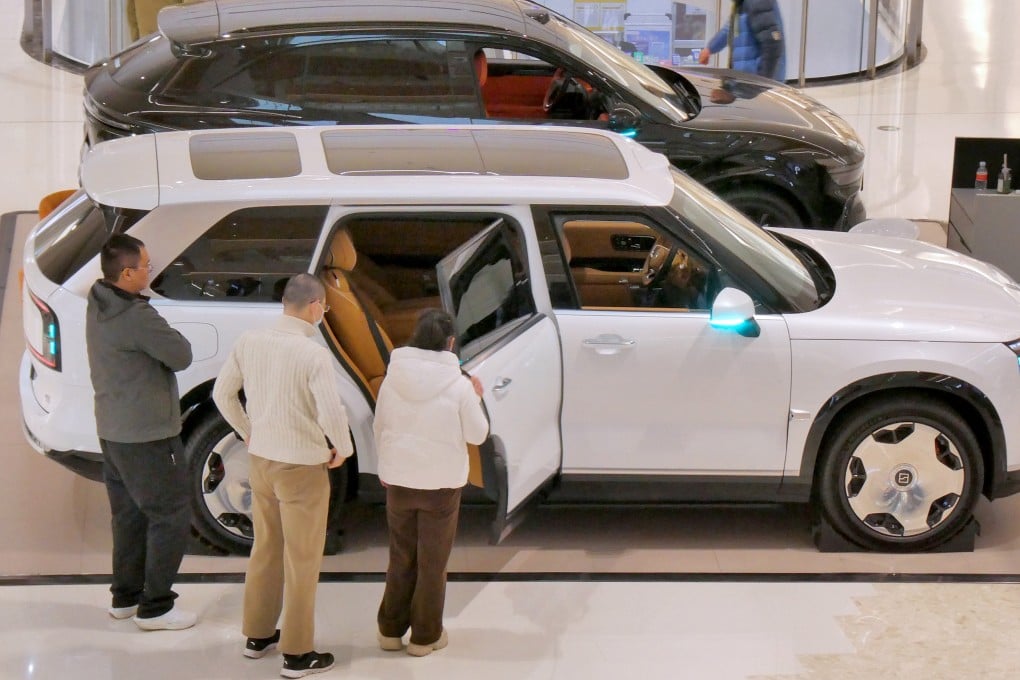 Potential buyers inspect a Zeekr 9X electric car at a shopping centre in Yantai, Shandong province, in March. Photo: CFOTO/Future Publishing via Getty Images