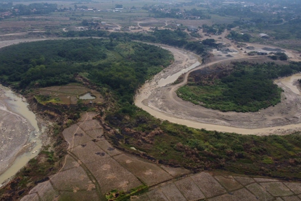 An aerial view of barren farmland on the banks of the Cipamingkis River in Indonesia's West Java province. Photo: NurPhoto via Getty Images