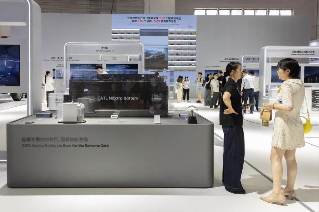 People view displays related to CATL’s sodium ion-based Naxtra battery at the China International Supply Chain Expo in Beijing on June 22. Photo: EPA