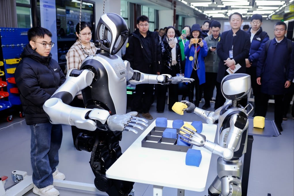 Visitors explore AI and robotics applications at last March’s launch event for Huawei’s AIPL at Beijing Institute of Technology, reflecting broader efforts to integrate AI into higher education and practical training.