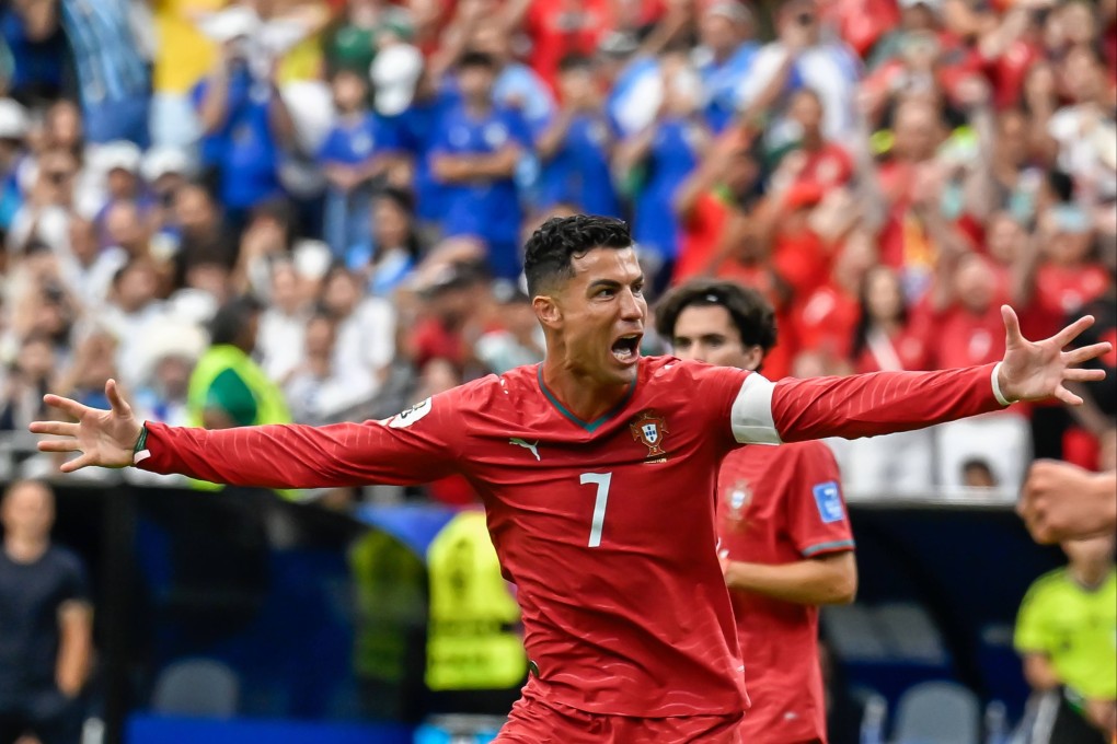 Cristiano Ronaldo celebrates scoring Portugal’s first against Uzbekistan. Photo: dpa