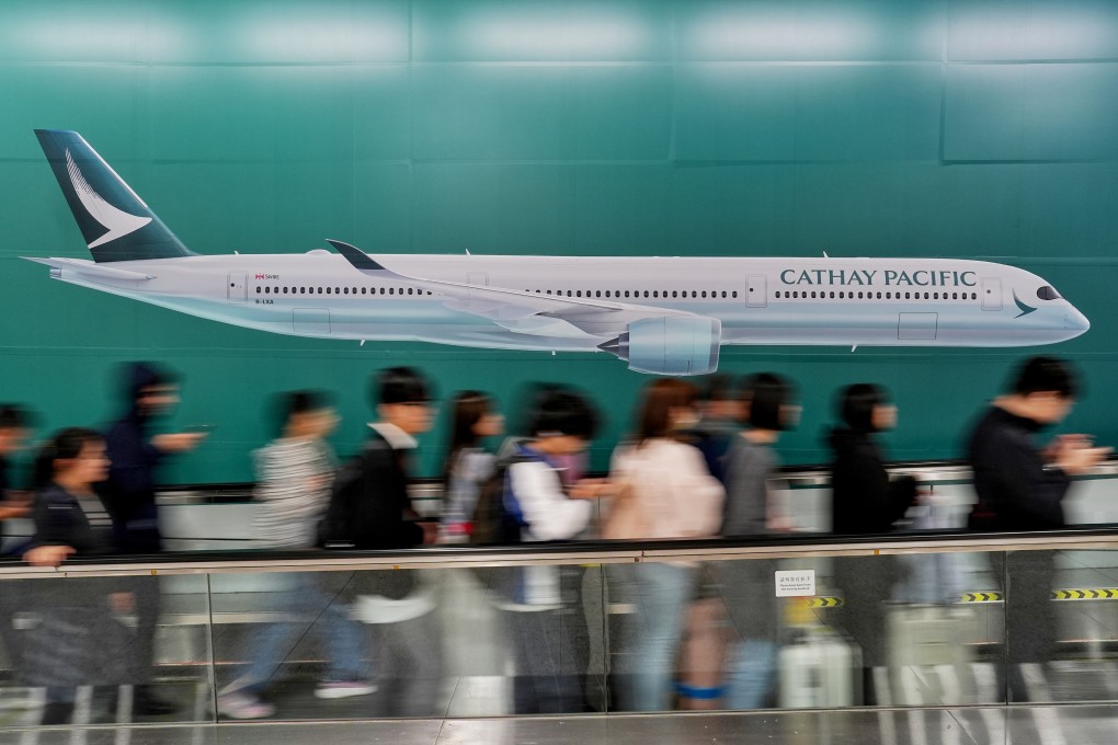 Despite the "don’t-look-up" philosophy of many mobile phone users, research has shown it takes commuters only a split-second glance to absorb an OOH advert. Photo: Elson Li