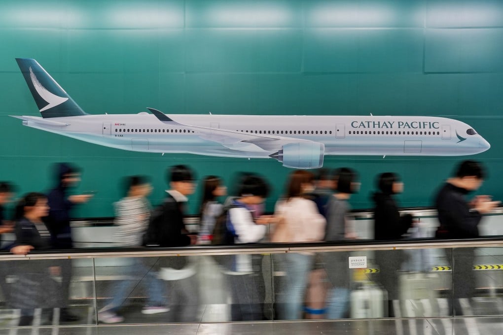 Despite the "don’t-look-up" philosophy of many mobile phone users, research has shown it takes commuters only a split-second glance to absorb an OOH advert. Photo: Elson Li