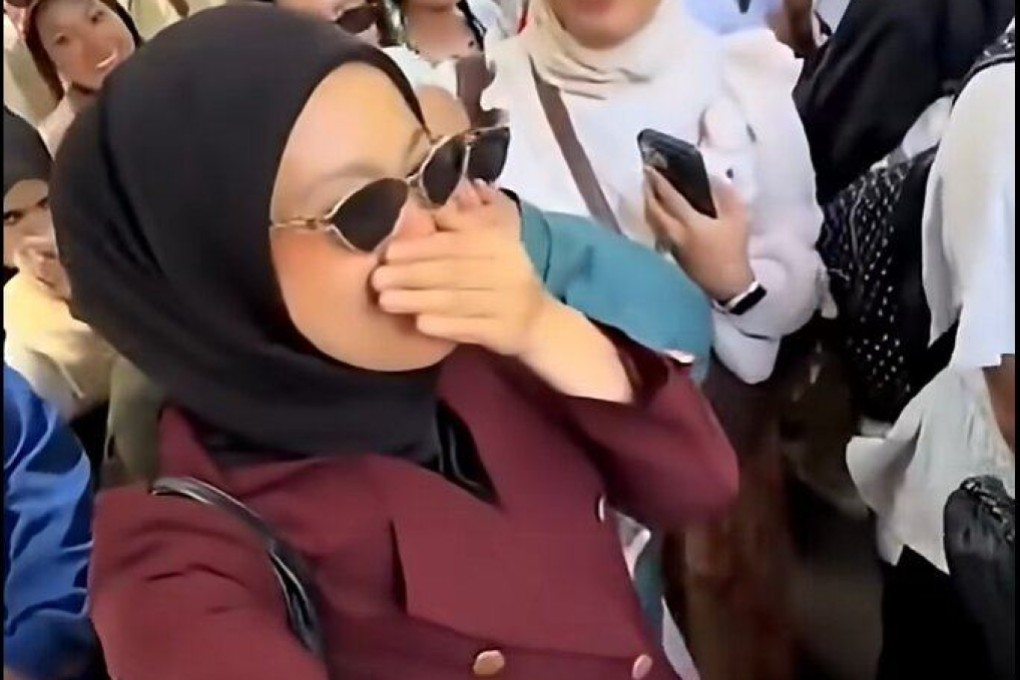 Malaysian tourists cover their noses and complain about “smelly” locals in China in a clip. Photo: TikTok/ekyn.wong