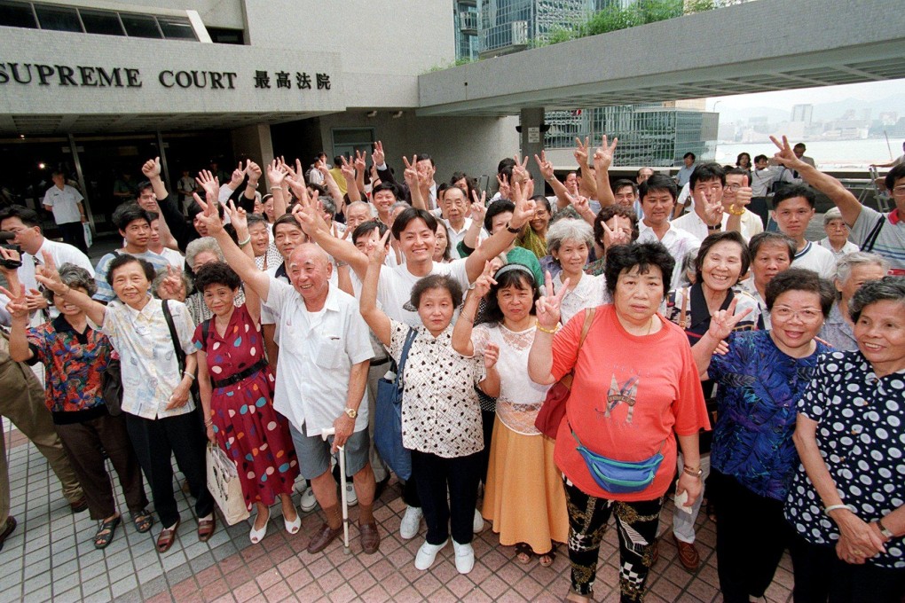 Rennie’s Mill residents celebrate outside the High Court after winning the court case on Jun 27, 1996. Photo: Robert Ng