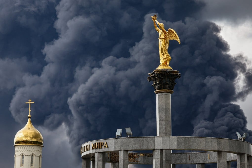Smoke billows behind an Orthodox church following a reported Ukrainian drone attack, in Moscow, Russia, on Thursday. Photo: EPA