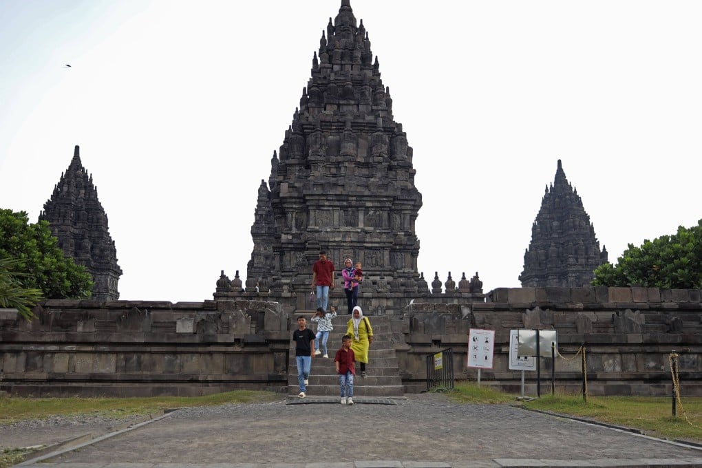 Tourists walk through the Prambanan temple complex in Sleman regency, Yogyakarta, Indonesia. Photo: Khairu Syukrillah/ZUMA Press Wire/dpa