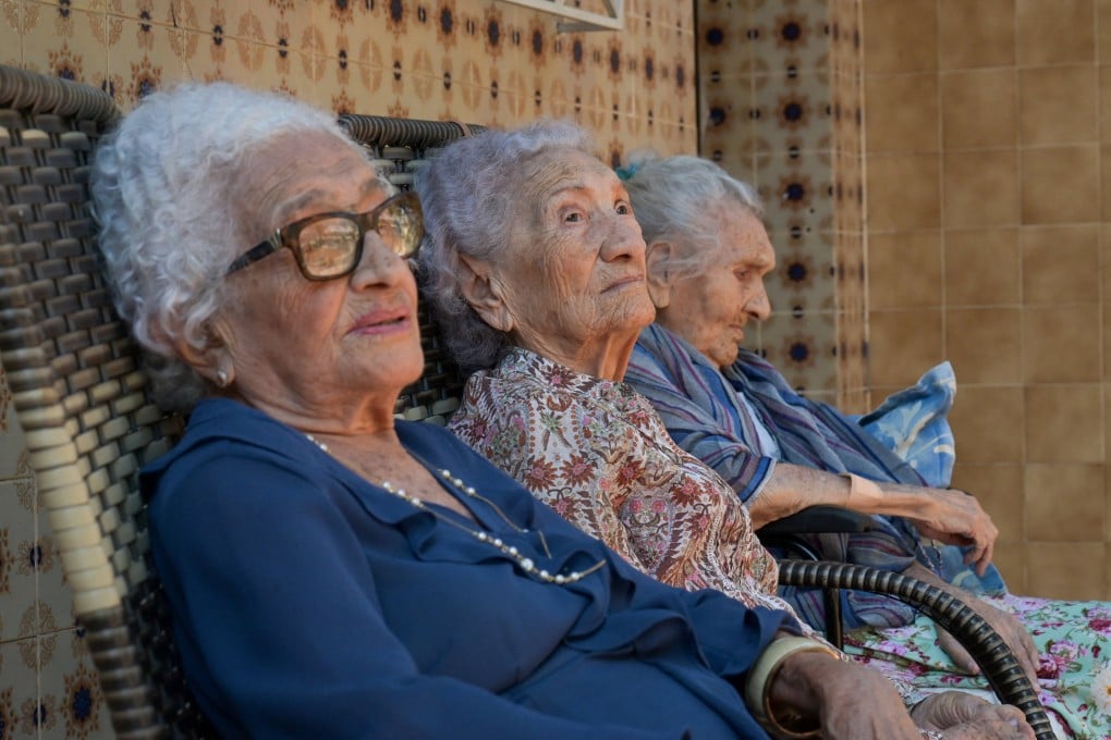 (From left) Zoraide de Deus Mota, Zulina de Deus Nunes and Levita de Deus Nunes, recognised as the world’s oldest living trio of sisters, are interviewed in Rio de Janeiro, Brazil, on Tuesday. Photo: Reuters