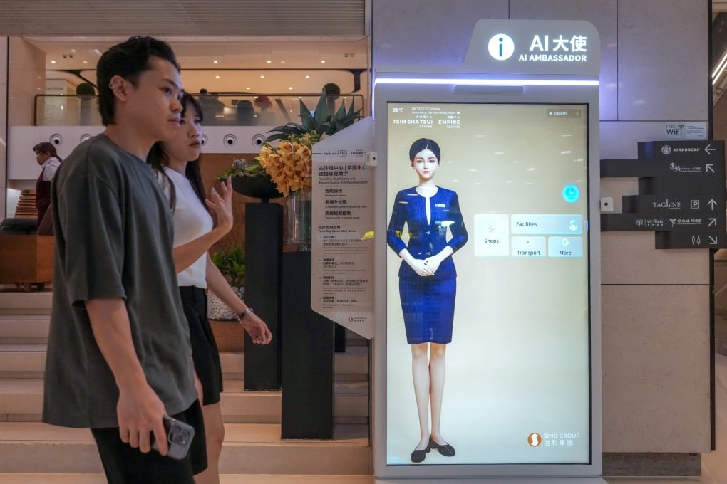 People walk past an AI ambassador in a shopping centre in Tsim Sha Tsui East on June 14. Photo: Karma Lo