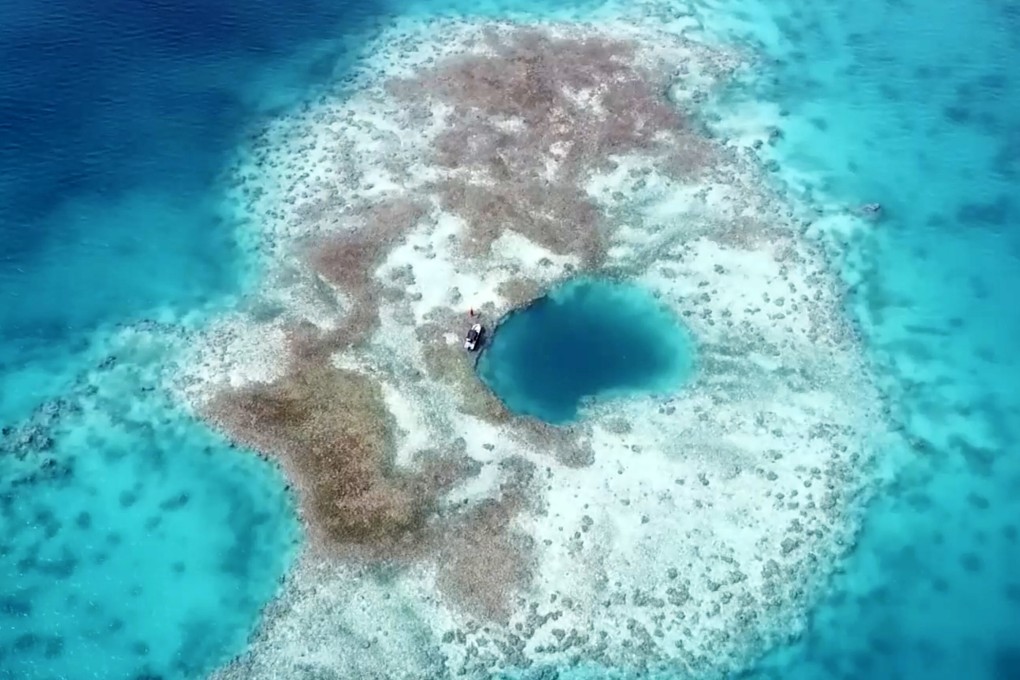 Unlike most of the world’s blue holes – which were once caves on land – the newly discovered blue hole within the Scarborough Shoal was formed by a coral reef. Photo: Ministry of Ecology and Environment