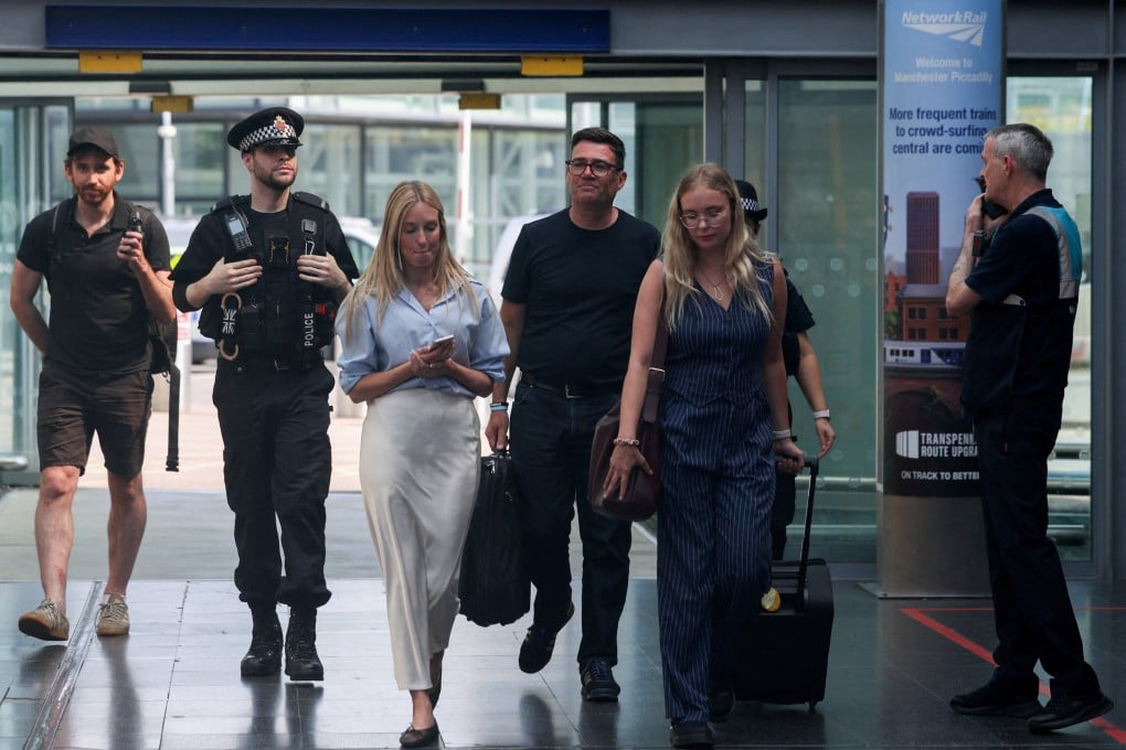 Newly elected Makerfield MP and former Greater Manchester mayor Andy Burnham (centre) walks at Manchester Piccadilly station in Manchester on June 22, as he leaves for London. Photo: Reuters