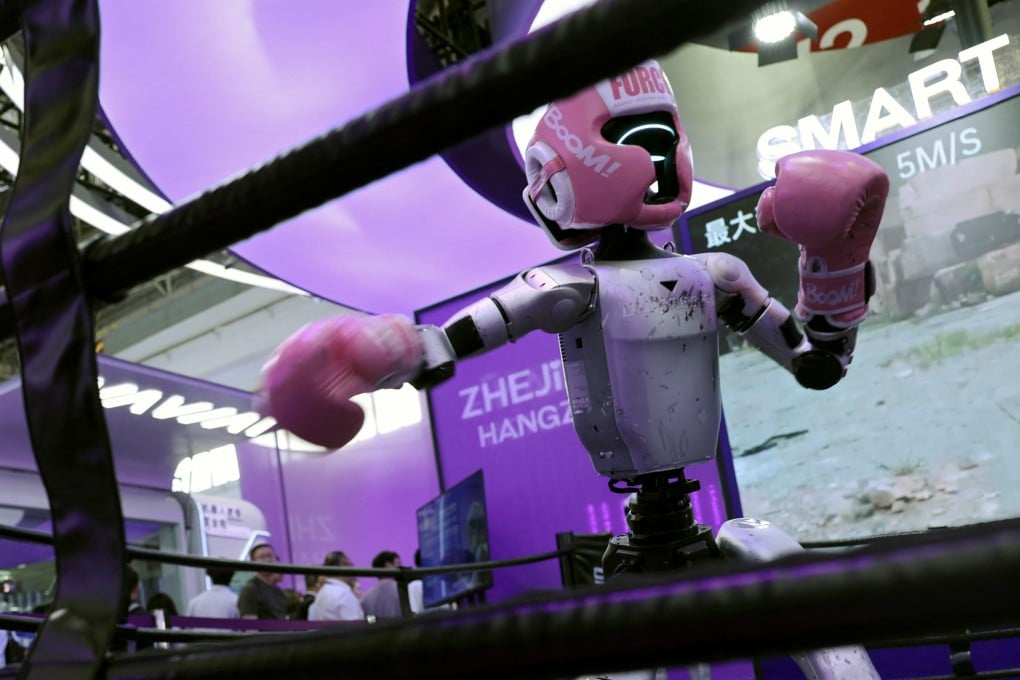 A Unitree humanoid robot demonstrates kickboxing moves at the China International Supply Chain Expo in Beijing on June 22. Photo: Reuters