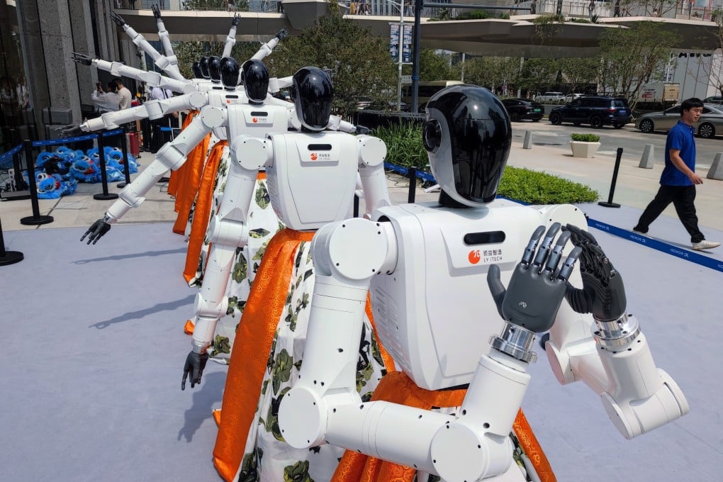 Lingyi iTech robots perform a thousand-hand Guanyin dance at the opening of Honor’s Alpha Global Flagship Store last September in Shenzhen. The store is a sign of AI’s growing ubiquity, something also demonstrated by the sector’s increasing importance to the HKEX. Photo: VCG via Getty Images