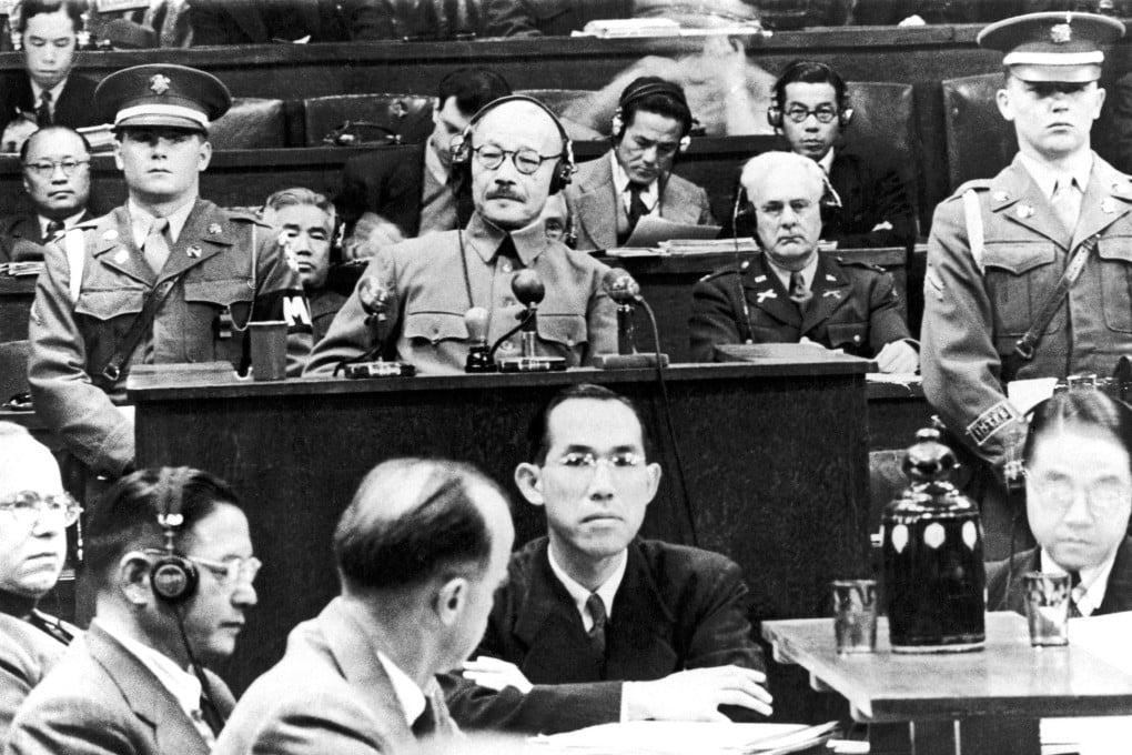 Former general and Japanese prime minister Hideki Tojo is surrounded by members of the military court in Tokyo during his trial on January 19, 1948. Photo: Gamma-Keystone via Getty Images