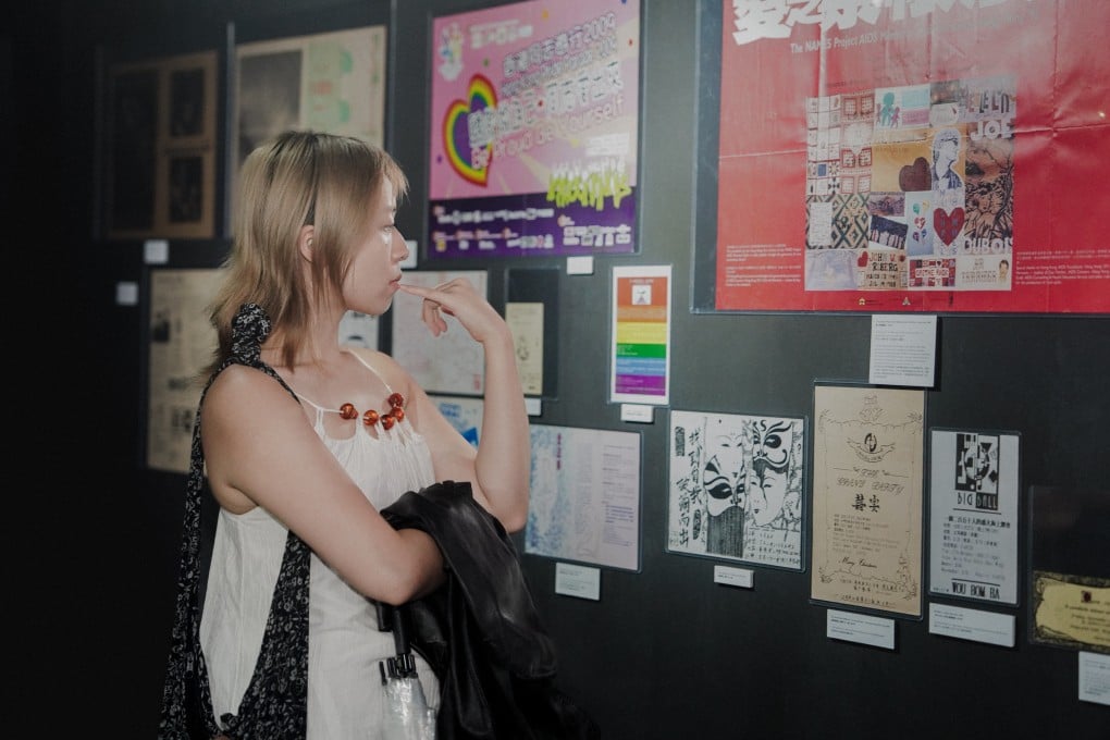 A visitor browses exhibits at “Offline Memories: Hong Kong LGBTQ+ Archive of Printed Matter from the Pre-Internet Era” at Eaton HK’s Tomorrow Maybe art space.