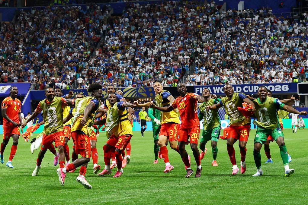 DR Congo’s Yoane Wissa (centre) celebrates scoring his side’s decisive third goal with teammates. Photo: Reuters