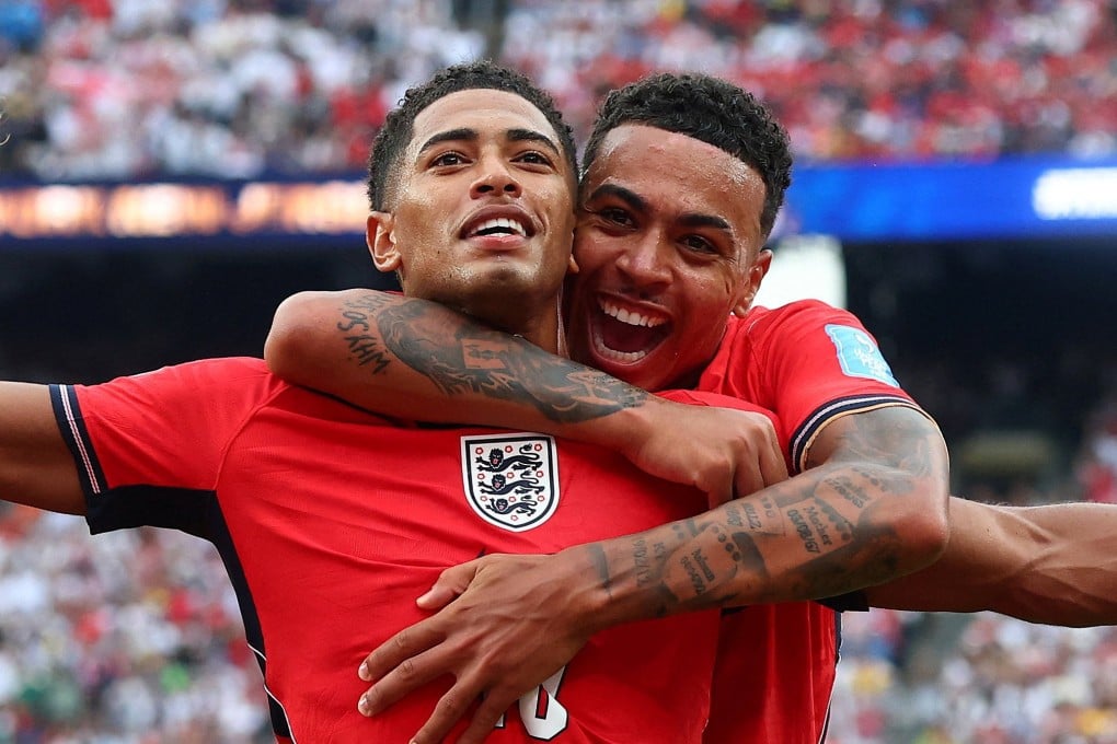 Jude Bellingham gets a hug from Morgan Rogers after scoring England’s first against Panama. Photo: Reuters