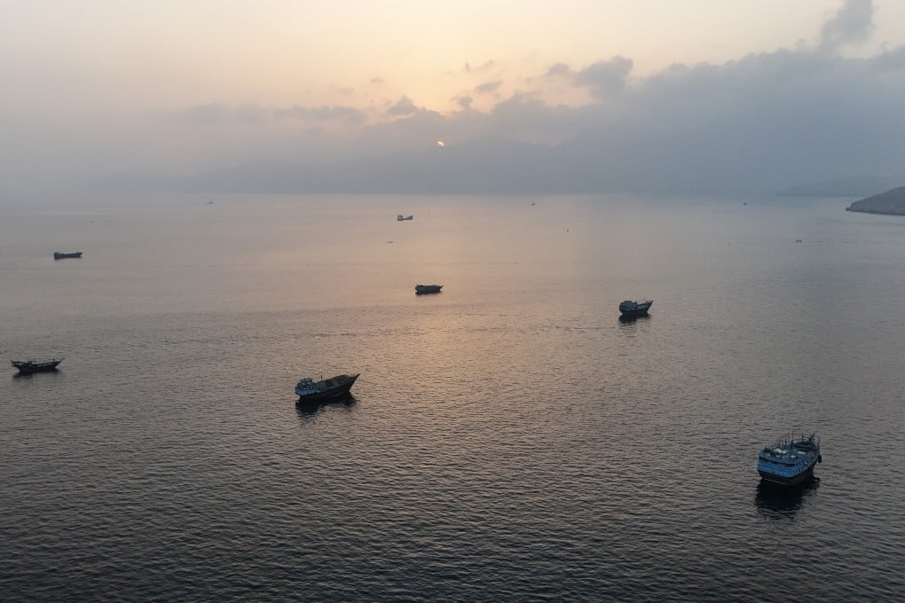 Ships anchored off Oman’s northern Musandam Peninsula near the Strait of Hormuz on Saturday. Photo: AFP/Getty Images/TNS