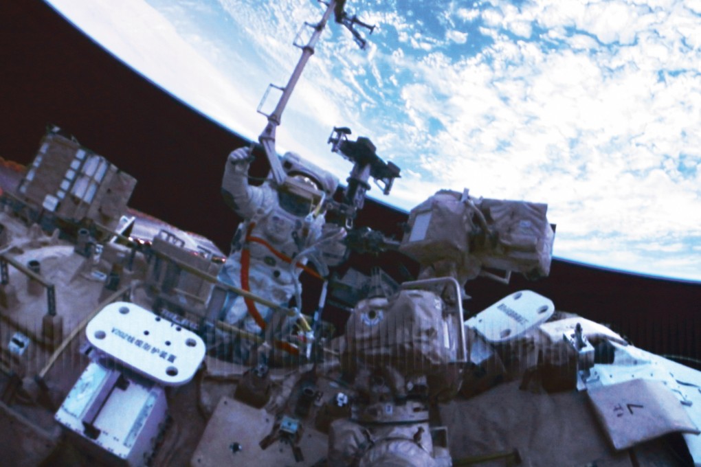 Shenzhou-21 astronaut Wu Fei performs extravehicular activities outside China’s orbiting space station in April. Photo: Xinhua