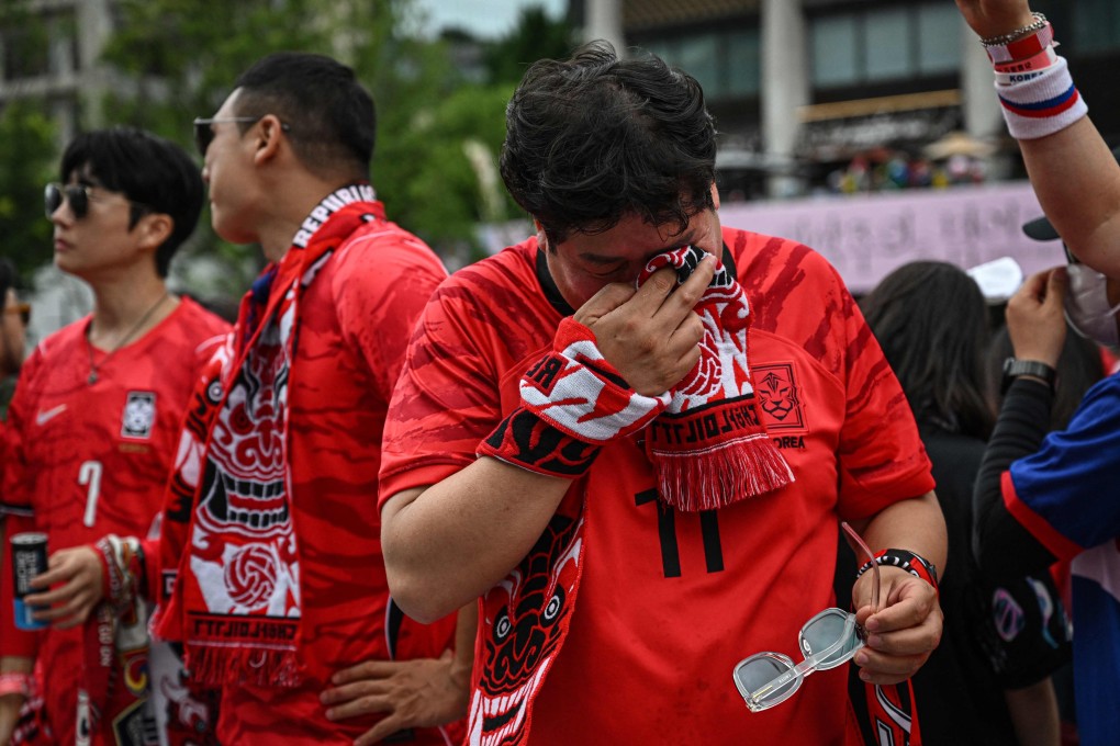 South Korean fans react after their team lost the 2026 World Cup football match against South Africa at Gwanghwamun Square in Seoul last week. Photo: AFP