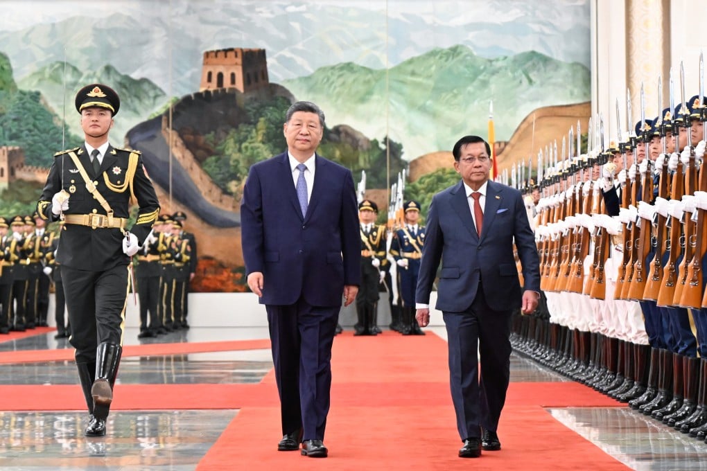 Myanmar’s President Min Aung Hlaing pictured with Xi Jinping during his recent visit to China. Photo: Xinhua