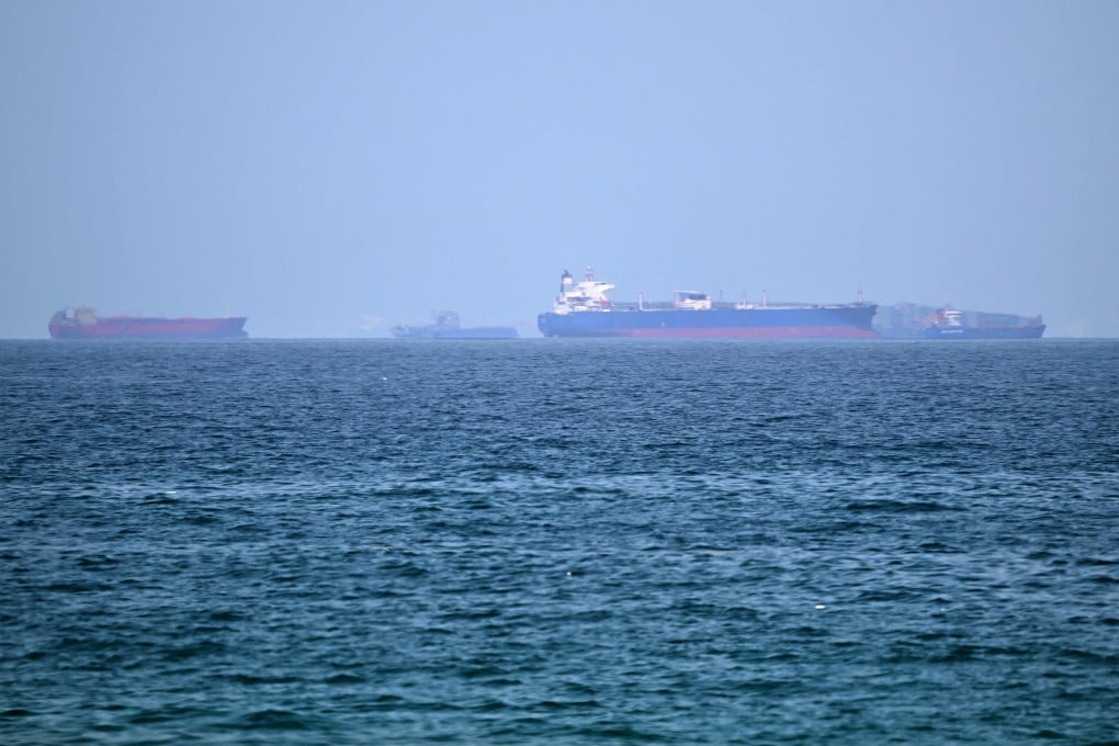 Cargo ships wait off the coast of the Khor Fakkan Container Terminal along the Gulf of Oman. Commercial shipping through the nearby Strait of Hormuz has faced severe disruptions. Photo: AFP