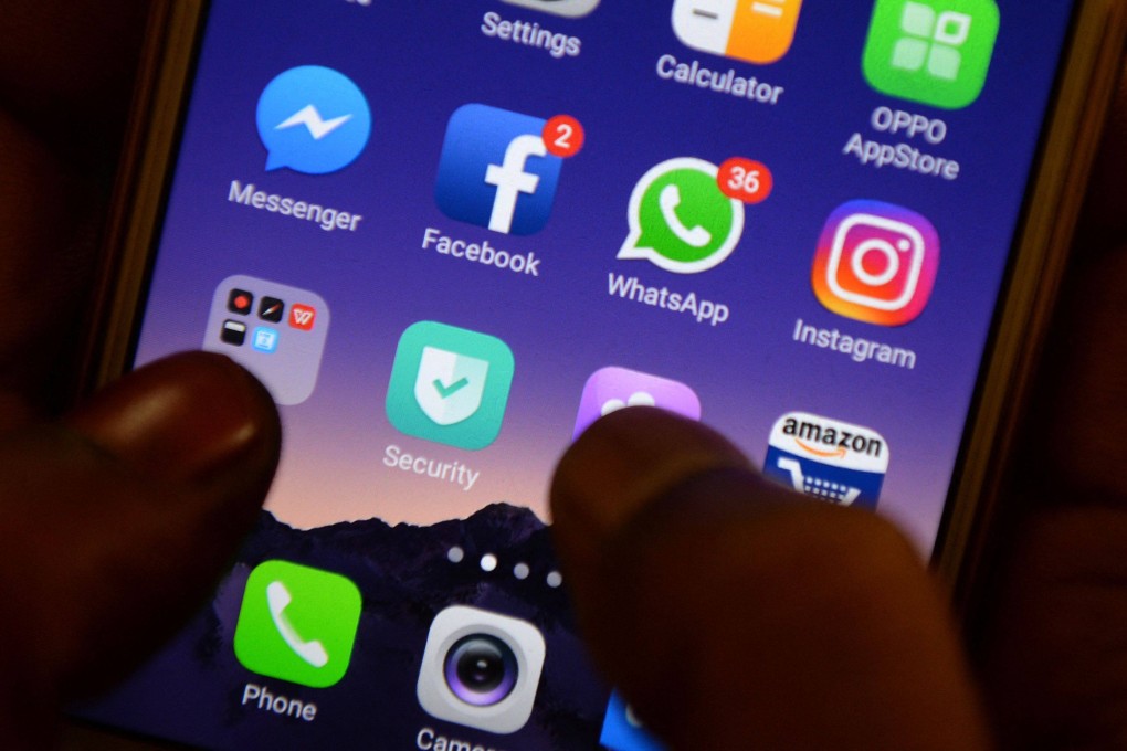 The victim had communicated with scammer using a WhatsApp profile featuring a professionally dressed woman. Photo: AFP