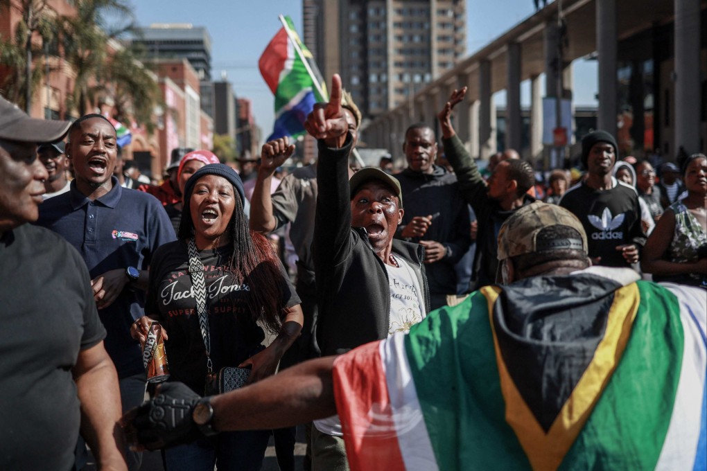 Protesters in Pretoria chant slogans on Tuesday during a demonstration marking an unofficial deadline set by citizen-led groups for undocumented foreign nationals to leave South Africa. Photo: AFP