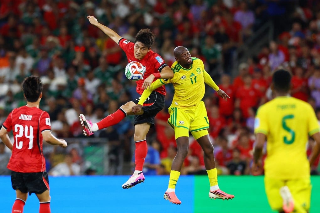 South Korea’s Park Jin-Seop (middle, in red) tussling with South Africa’s Evidence Makgopa in a match the Koreans lost 1-0 last Thursday. Photo: Reuters