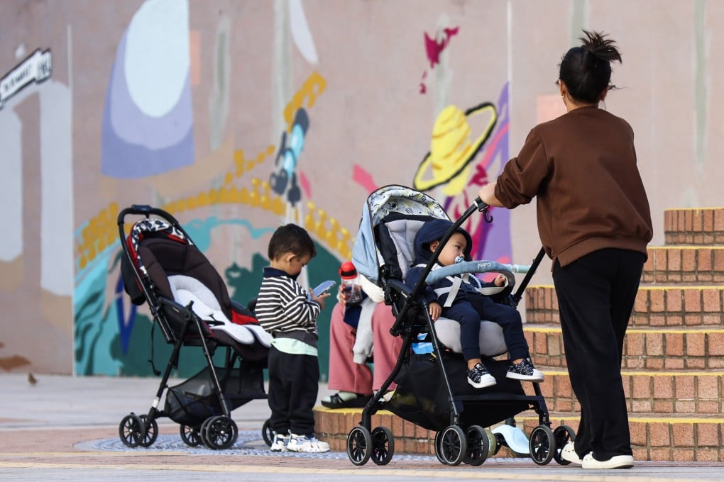 Children in strollers at Hong Kong’s Tsim Sha Tsui district. The blanket requirement that baby prams and strollers be folded before boarding buses is a challenge for parents, especially those travelling alone with a newborn. Photo: Jelly Tse