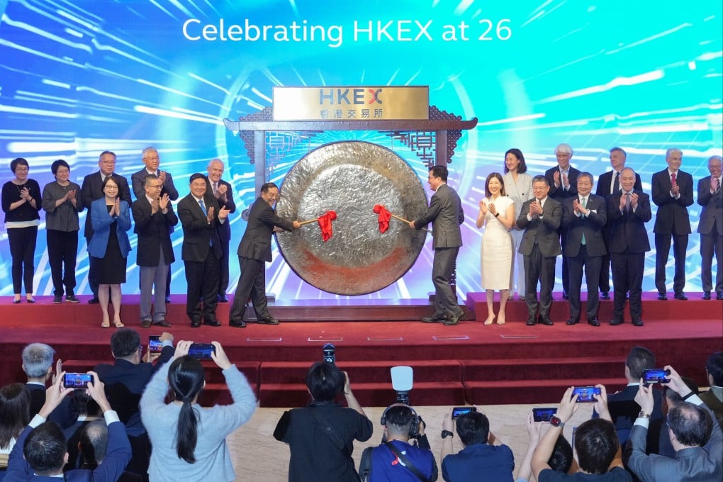 A gong is struck to mark the HKEX’s 26th anniversary at Connect Hall on Friday. Photo: May Tse