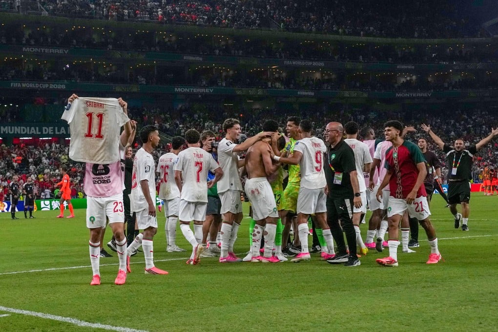 Morocco celebrate beating the Netherlands during the World Cup round of 32 match. Photo: AP